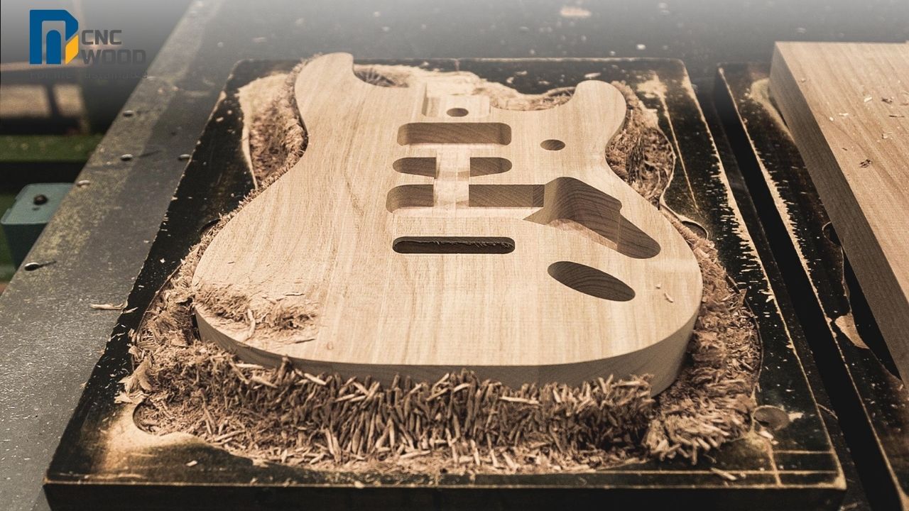 Làm đàn guitar